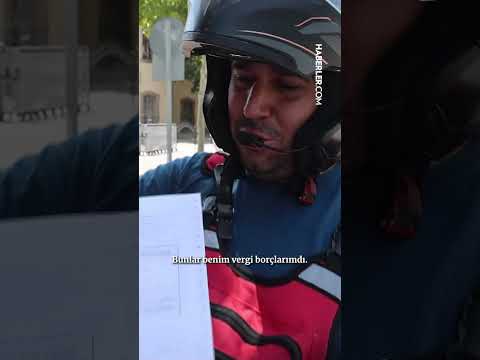 Yakalama kararı olan motorunu kurtarmak için yola 3 metrelik vergi dekontu serdi